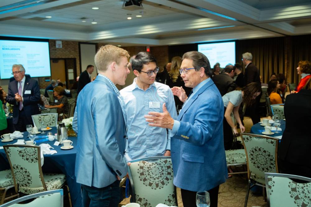 Jim Brooks talking to students at Scholarship Dinner 2019